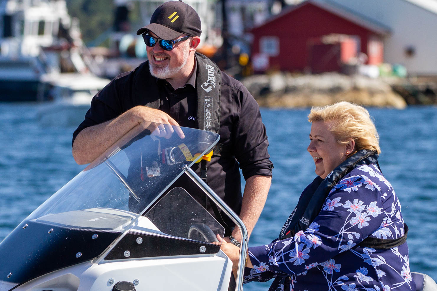 Leif Stavøstrand with Norwegian Prime Minister Erna Solberg driving an electric boat