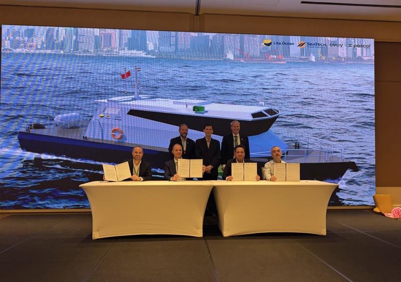 Evoy Business Development Manager Mads sign agreement in Singapore to propel maritime electrification